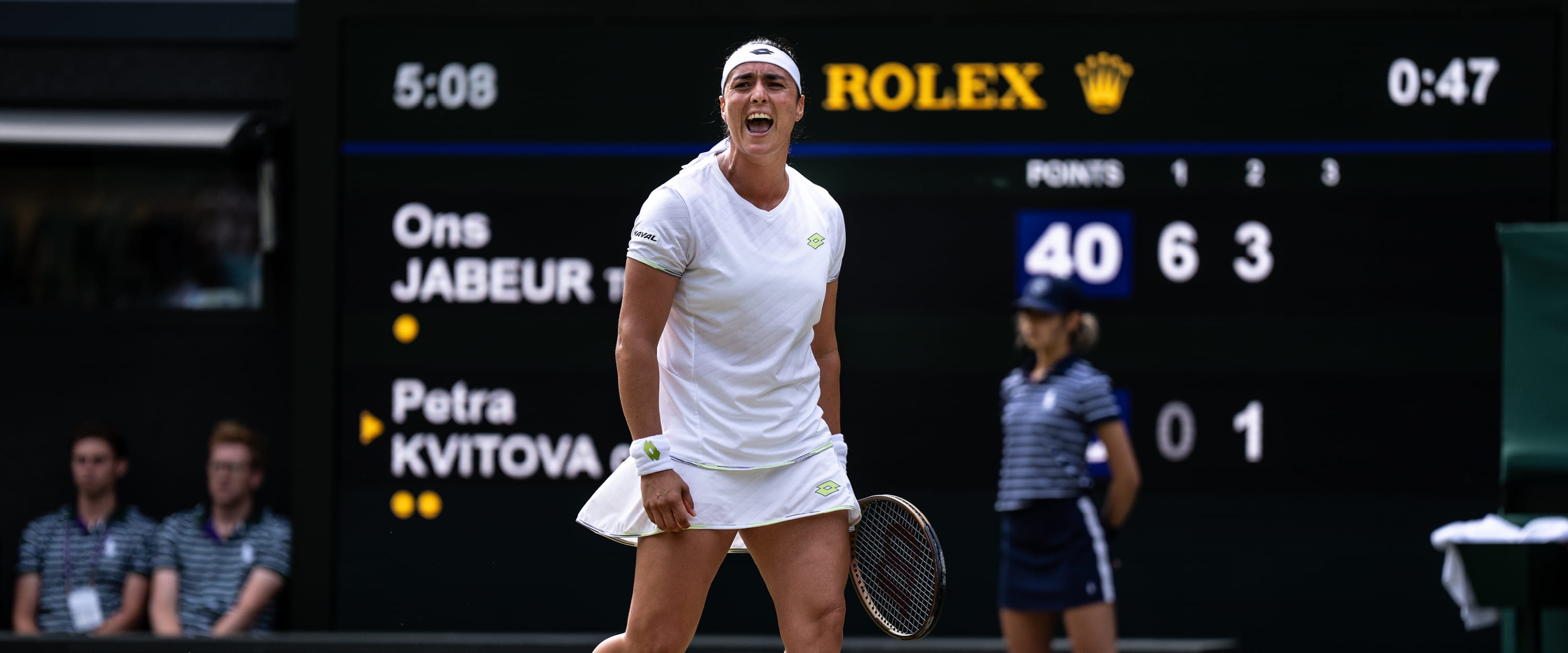 Women's tennis player Ons Jabeur celebrating a shot during a match on Centre Court at Wimbledon in 2023