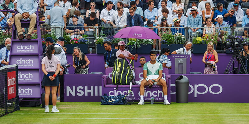 Carlos Alcaraz taking a break between sets at the cinch Championships, Queen's Club