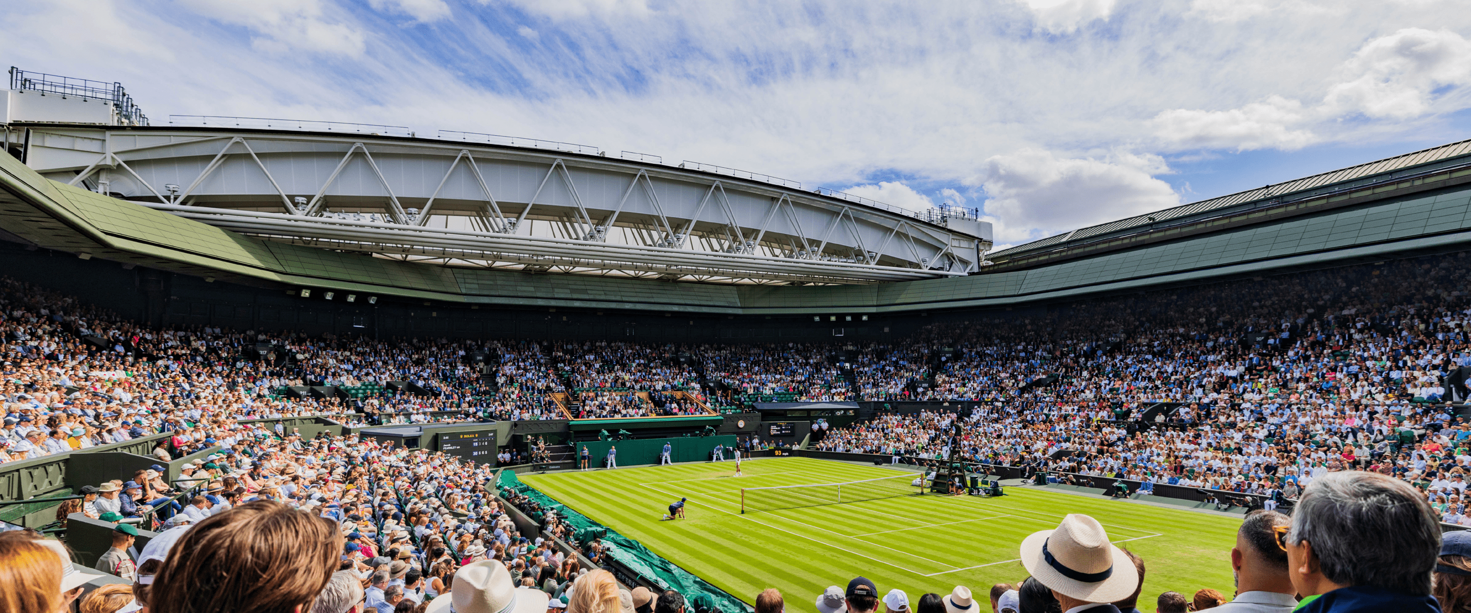 View of Centre Court from the seats in the crowd during a match at The Championships Wimbledon 2024