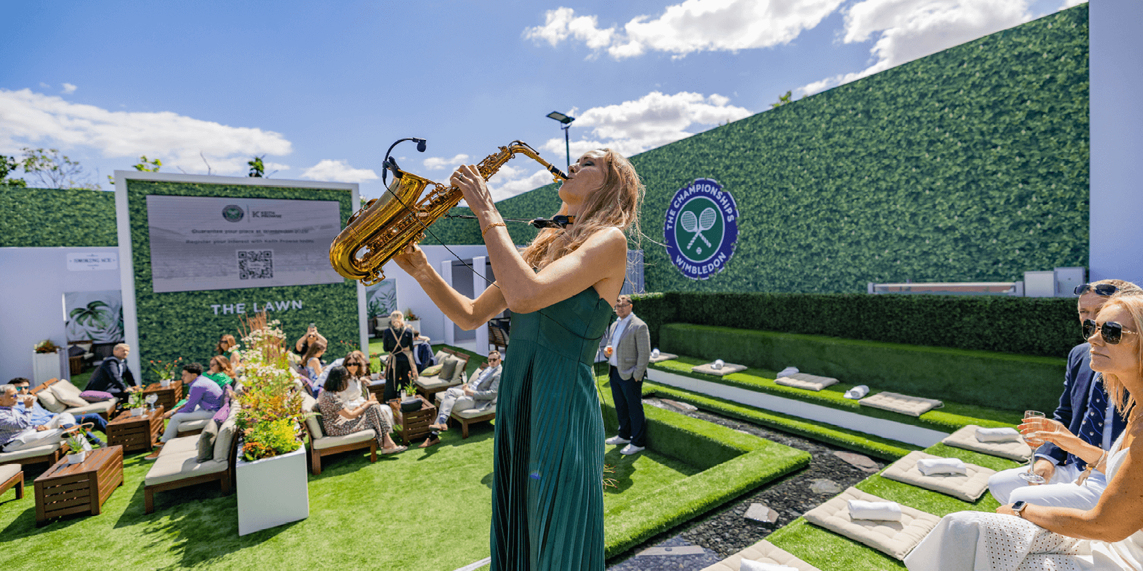 Saxophonist playing in The Lawn Garden hospitality at The Championships, Wimbledon for guests at the tennis