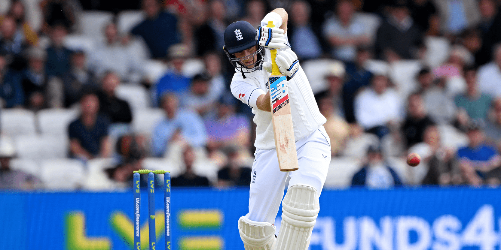England cricketer Joe Root hitting the ball whilst batting during a Test Match