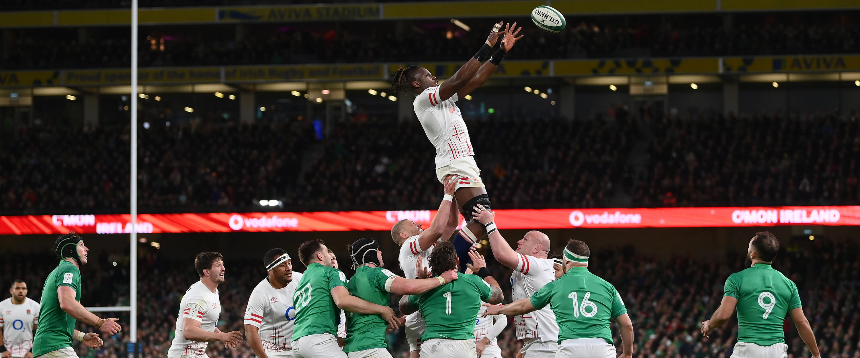 England rugby player Maro Itoje jumping for the ball during an England line out playing against Ireland in the 2023 Guinness Six Nations