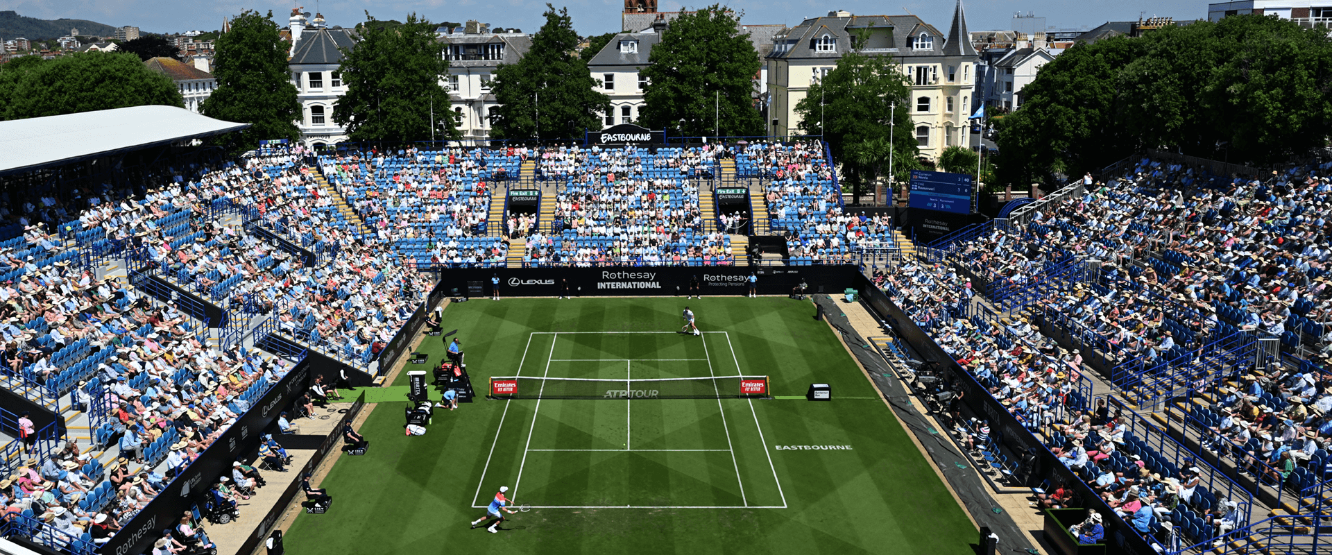 A view of Centre Court with players during a match and the crowd watching at the Rothesay International Eastbourne tennis tournament at Devonshire Park