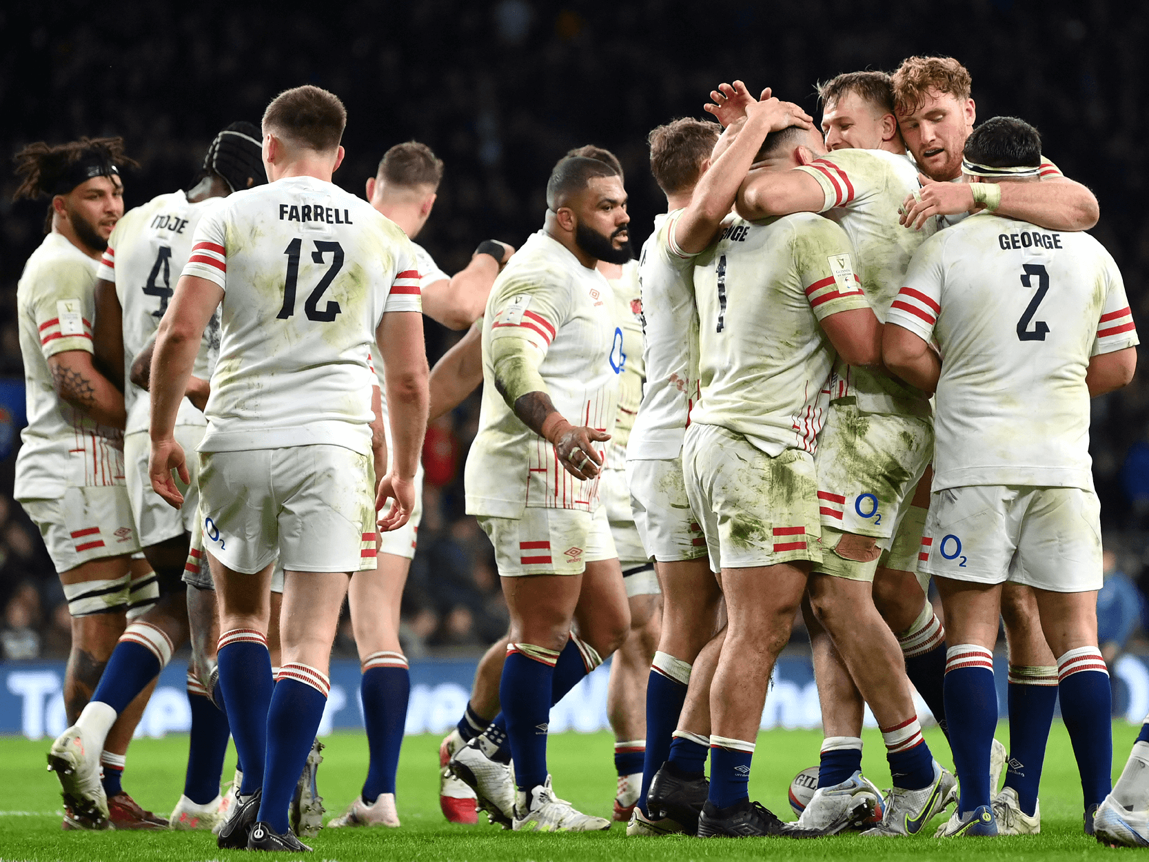 The England Rugby team celebrating and hugging after a match in Twickenham at the Allianz Stadium