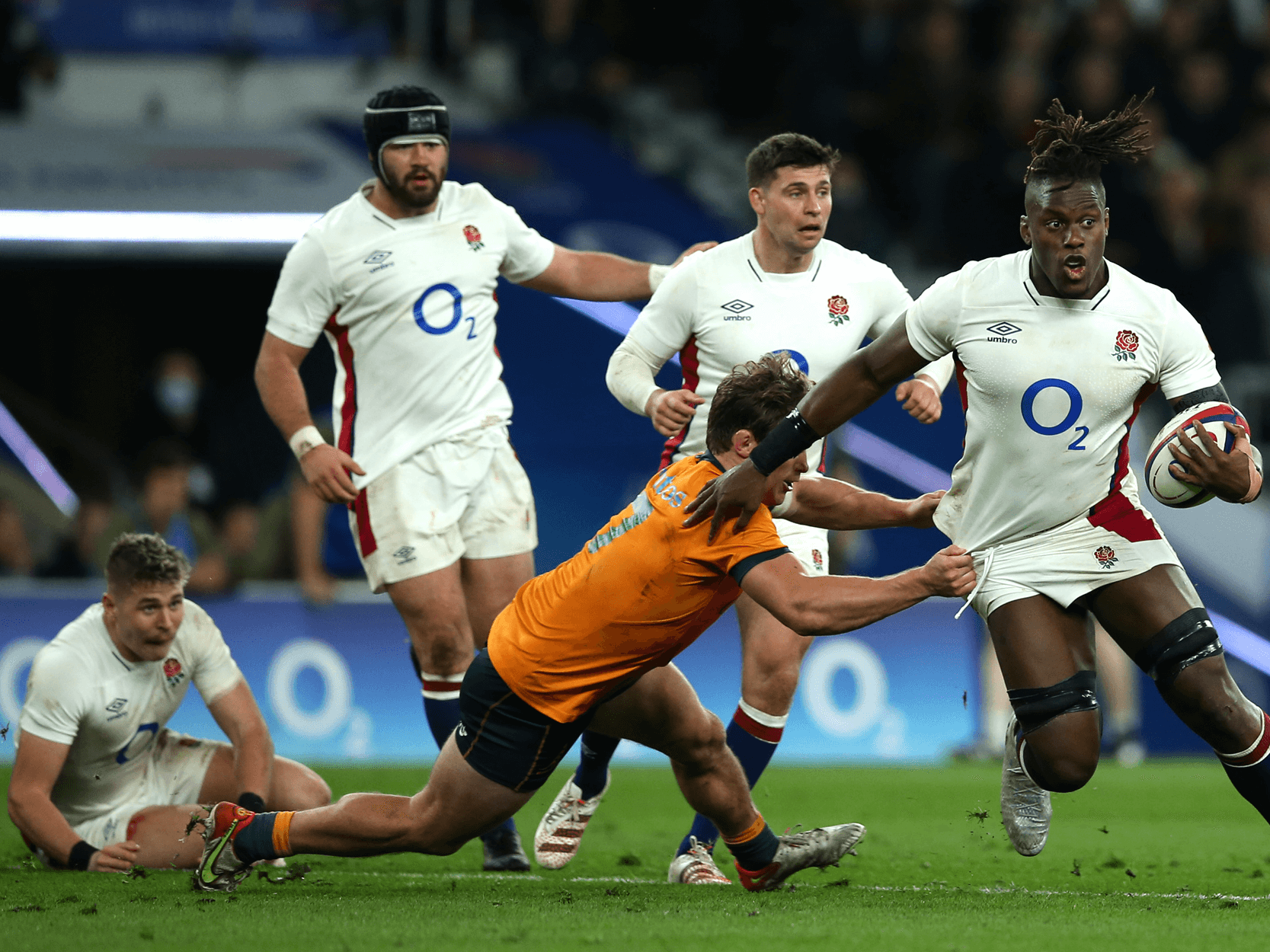 England Rugby player Maro Itoje running with the ball while being tacked against Australia in the Autumn Nations Series at the Allianz Stadium formerly known as Twickenham Stadium