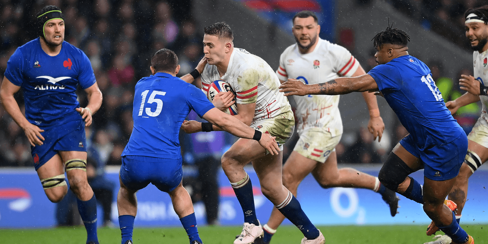 England rugby player Freddie Steward running with the ball in a match against France at Allianz Stadium Twickenham