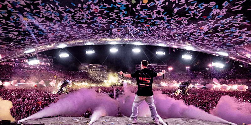 Tomorrowland DJ set with fireworks and confetti