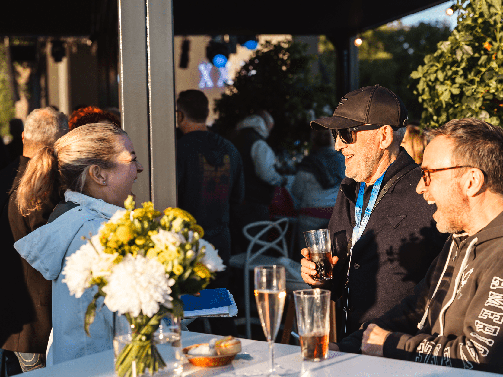Guests in hospitality with Keith Prowse on the Great Oak Roof Garden at BST Hyde Park chatting and drinking