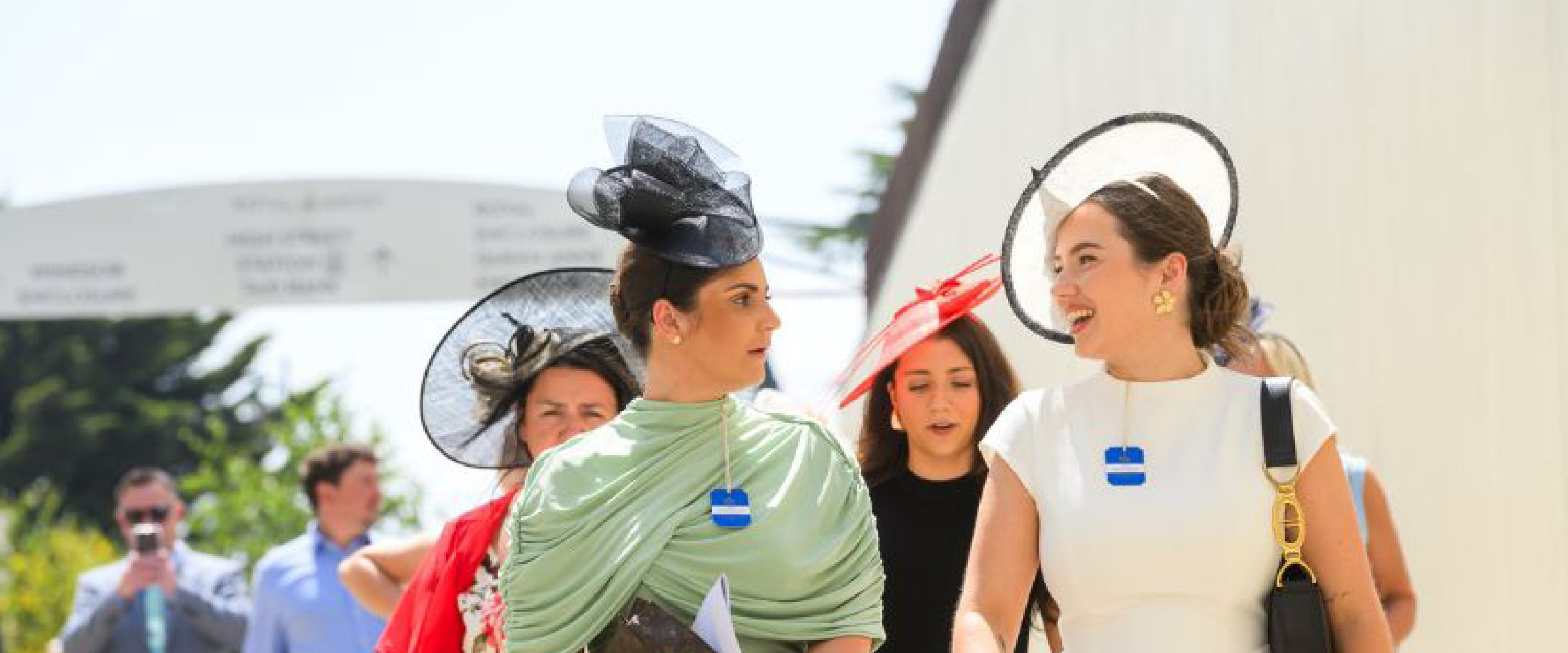 Guests chatting and walking into Ascot for Royal Ascot