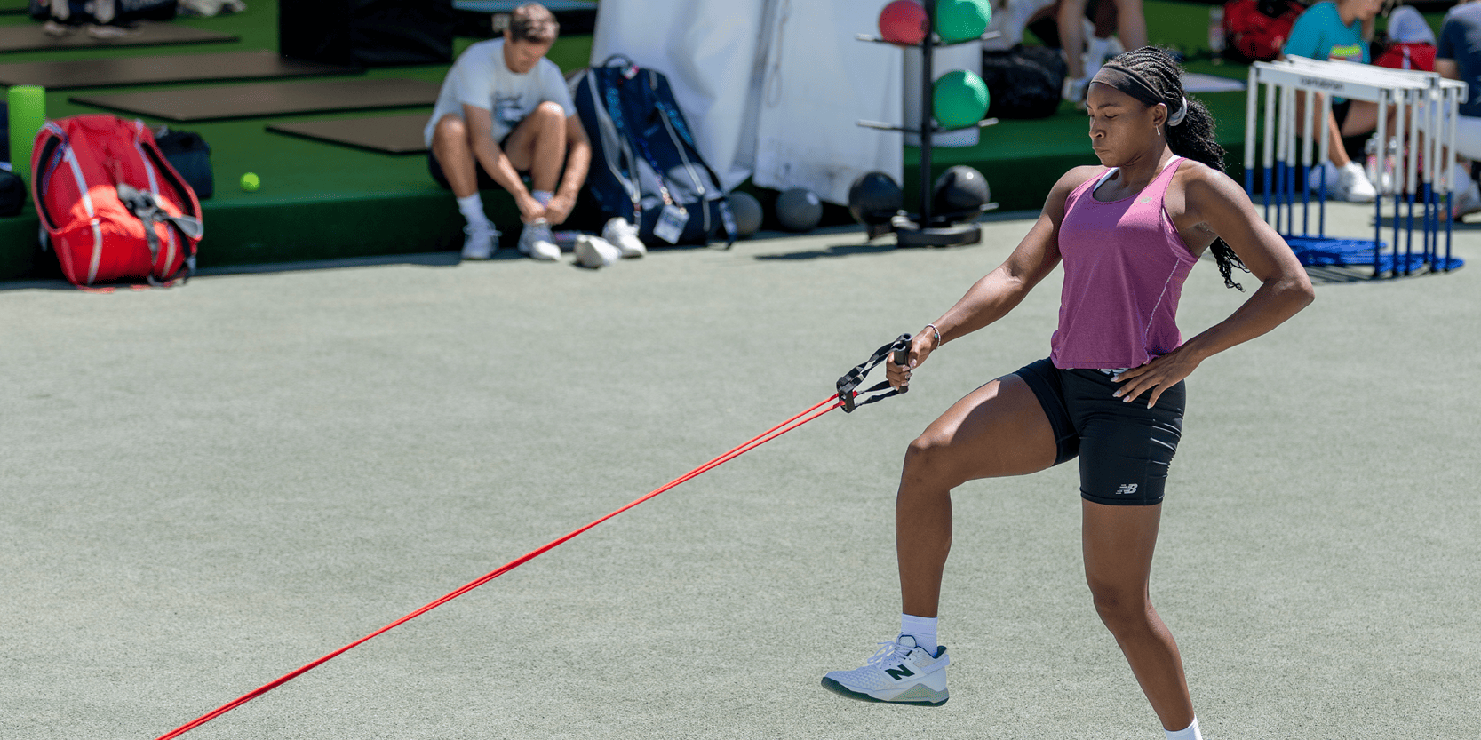America tennis player Coco Gauff warming up with strength training before a match