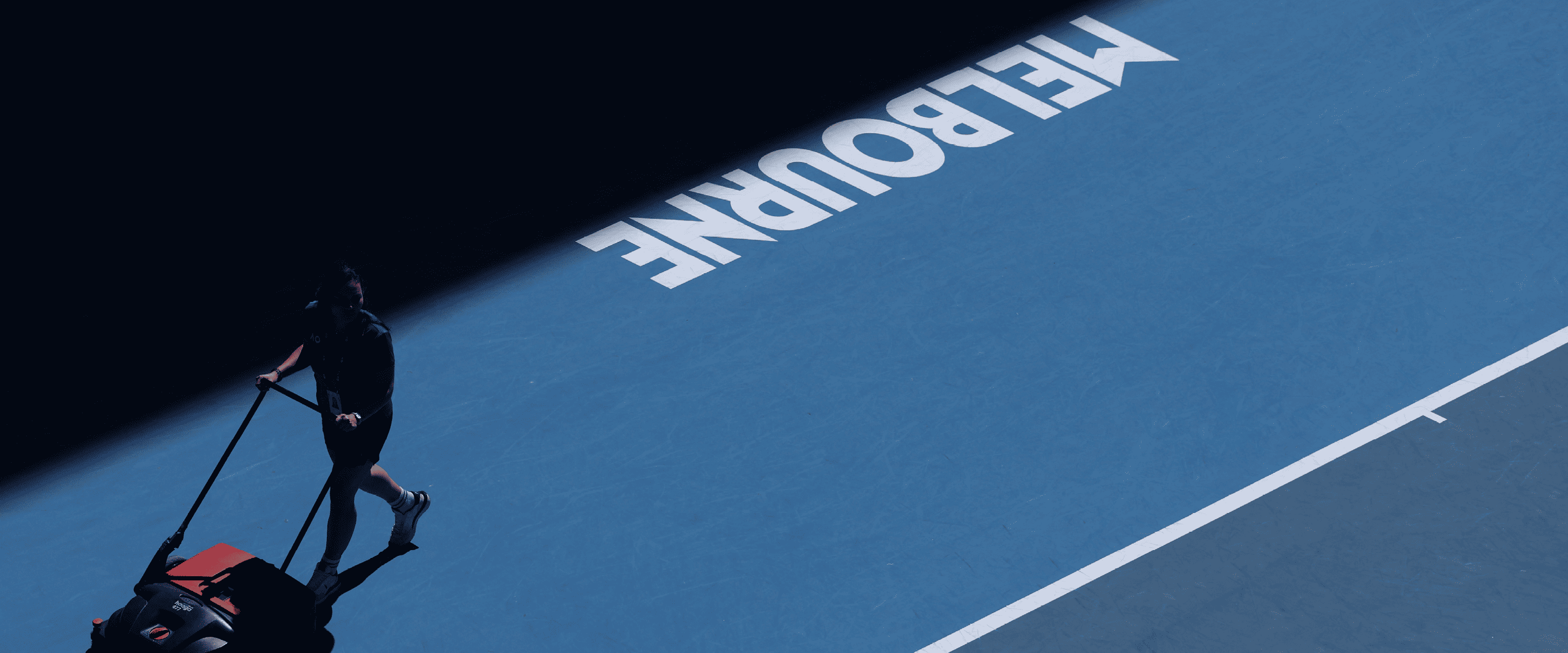 Australian Open tennis court being prepped by the ground staff