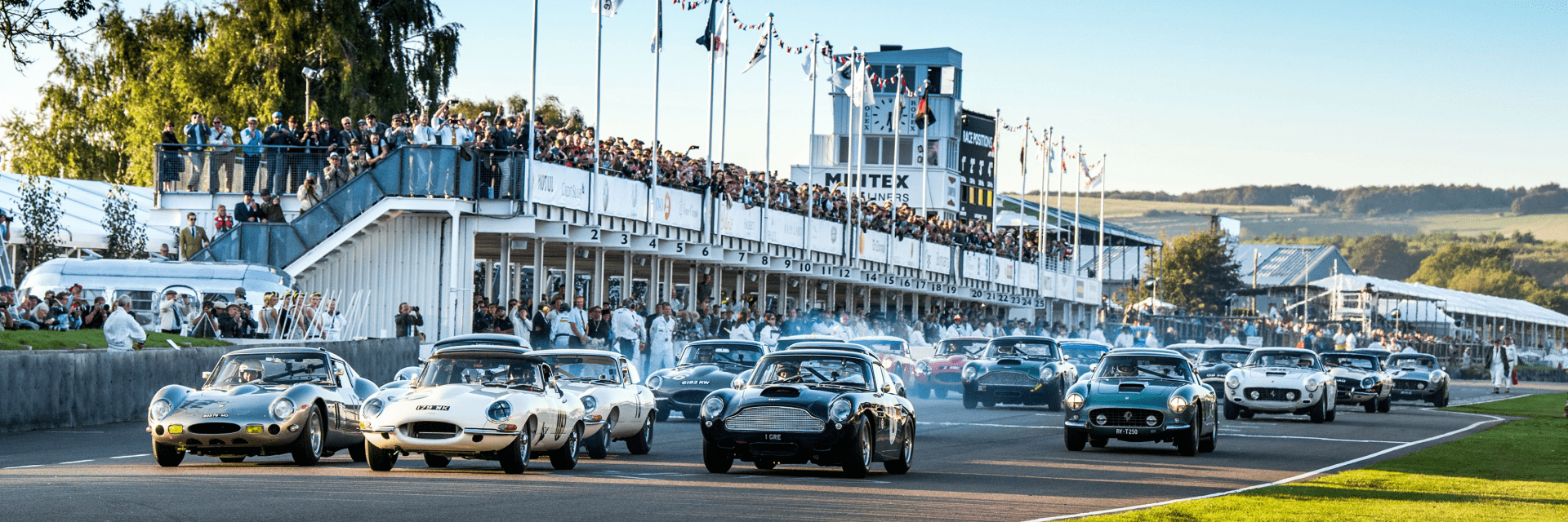 Cars racing at Goodwood Revival