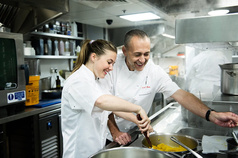 Michel Roux Jr and Emily Roux cooking at Le Gavroche Restaurant