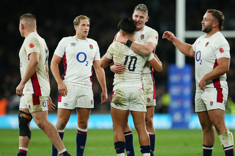 England rugby team celebrating a score at Twickenham Stadium during the autumn internationals