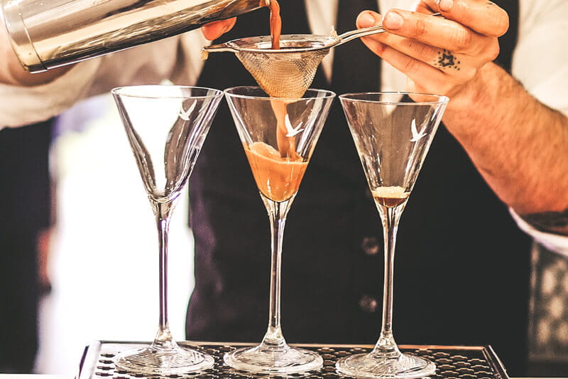 Espresso Martini cocktails being made by a barman