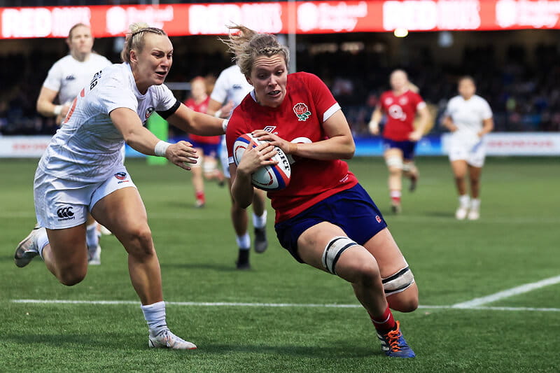 England women's rugby player Zoe Aldcroft scoring a try