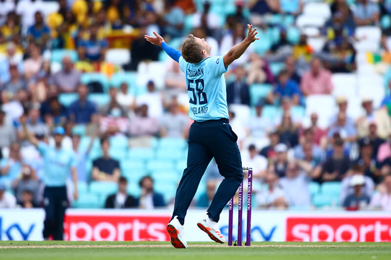 England Cricket player Curran celebrating on the pitch