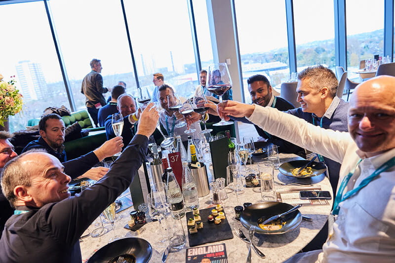 Guests enjoying a sit down meal in The East Wing hospitality at Twickenham Stadium