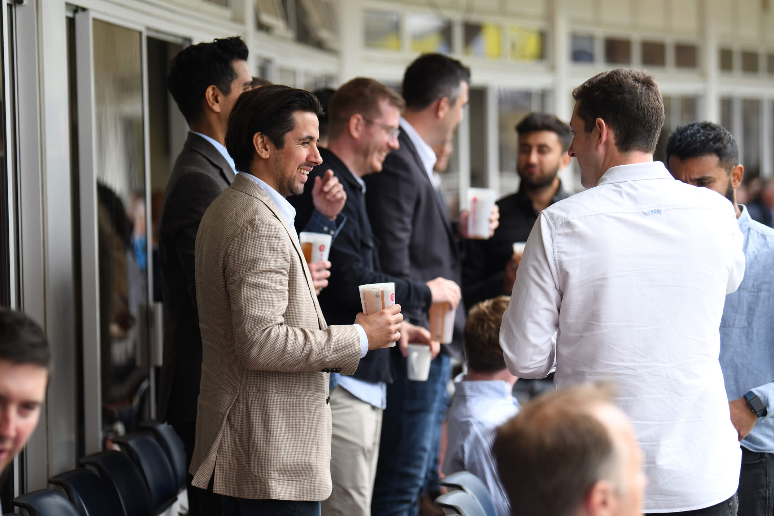 Guests Enjoying Hospitality at the Cricket