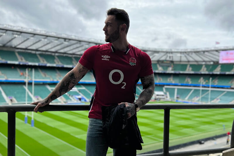 Influencer and model Lewis Craddock in Twickenham Stadium watching the autumn internationals match