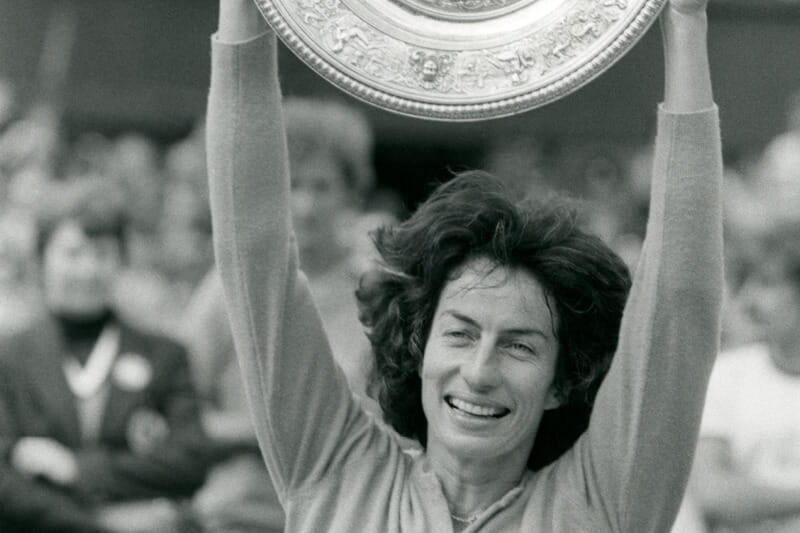 Virginia Wade lifting the Championship trophy at Wimbledon