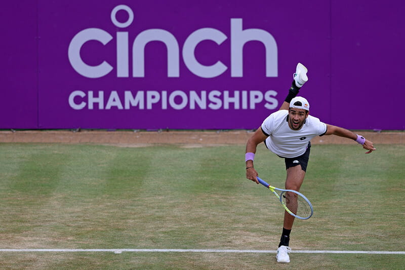 Matteo Berrettini serving in a match at cinch Championships at The Queen's Club in 2021