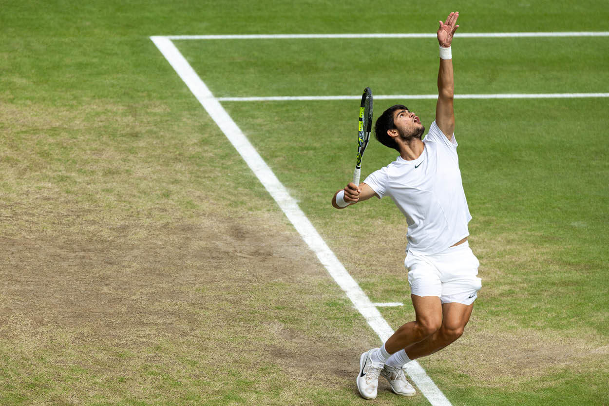 World number one tennis player Carlos Alcaraz serving during the 2023 Wimbledon final against Novak Djokovic on Centre Court