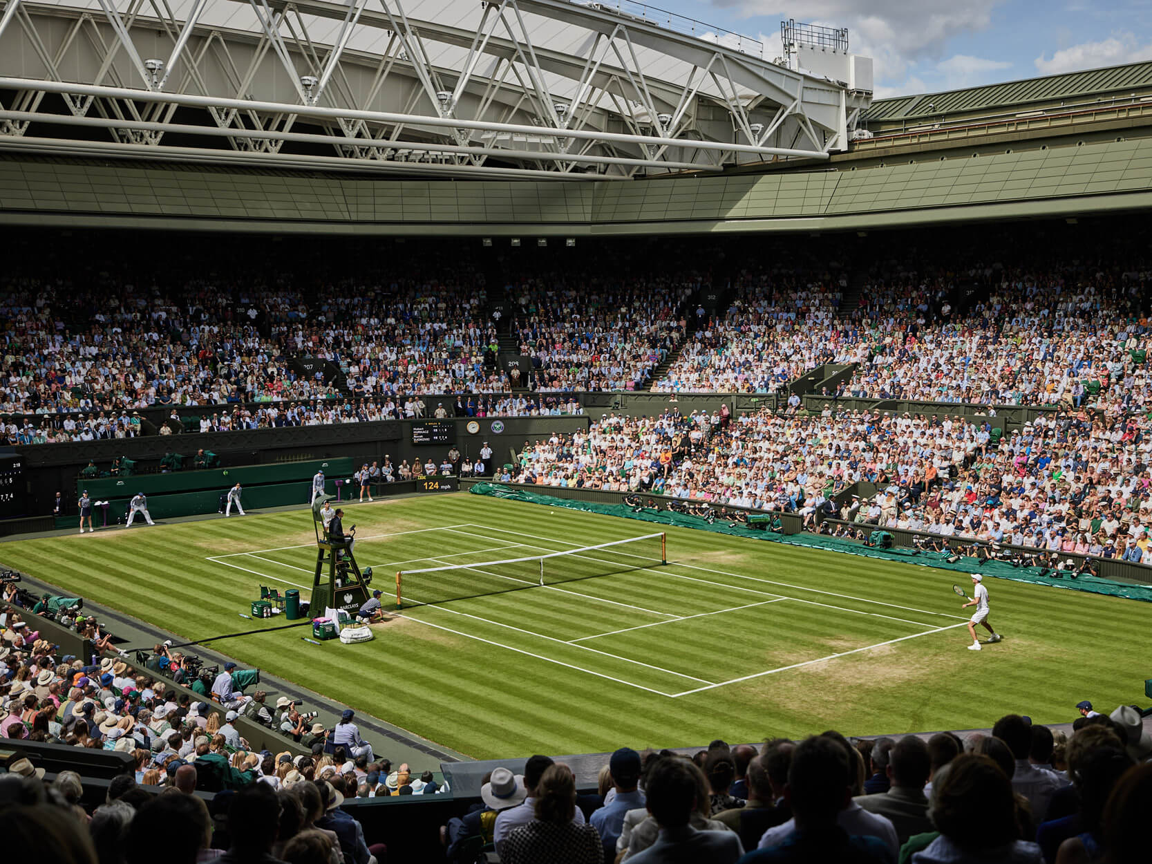 Tennis players during a match on Centre Court at The Championships Wimbledon