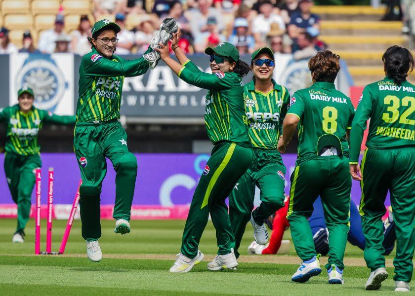 Pakistan Women cricket team celebrate taking a wicket