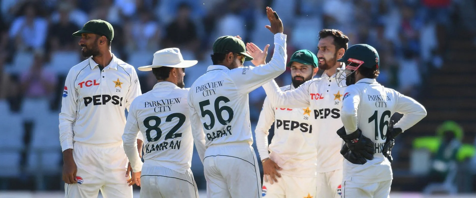 Pakistan cricket team celebrate taking a wicket