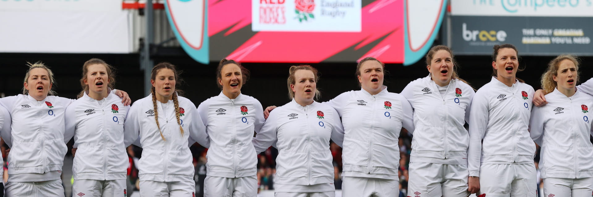 The Red Roses line up for the national anthem