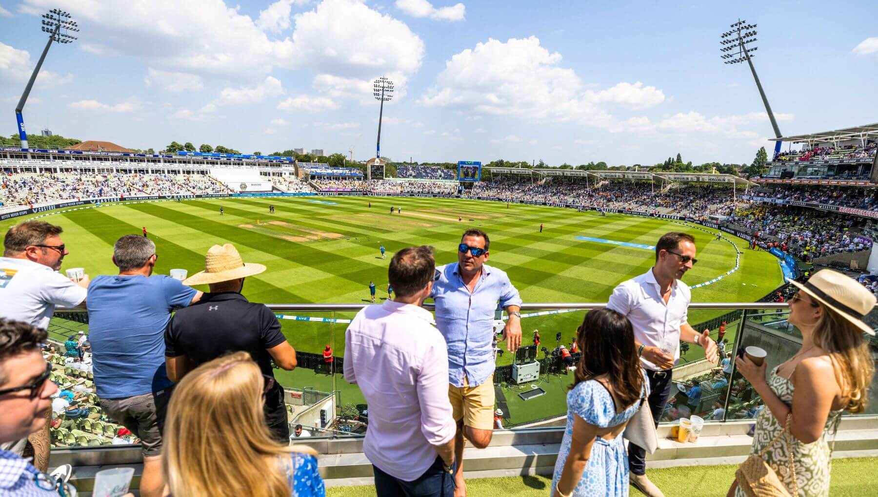 Guests enjoying the balcony in the Experience Club