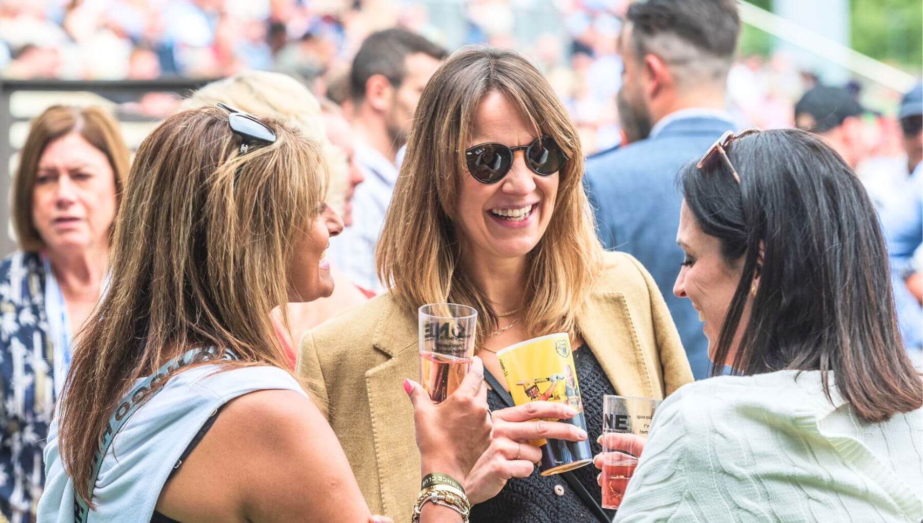 Guests enjoying the balcony in the Experience Club
