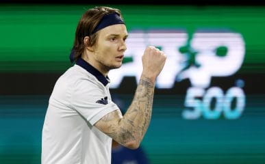 Alexander Bublik of Kazakhstan celebrates scoring a point at Dubai Duty Free Tennis Championships.