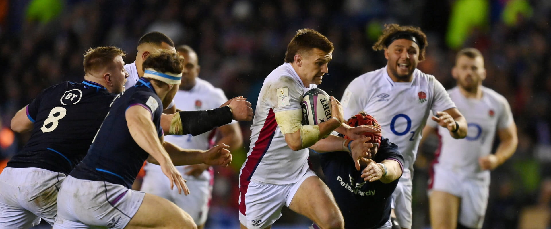 England's Henry Slade on the charge against Scotland