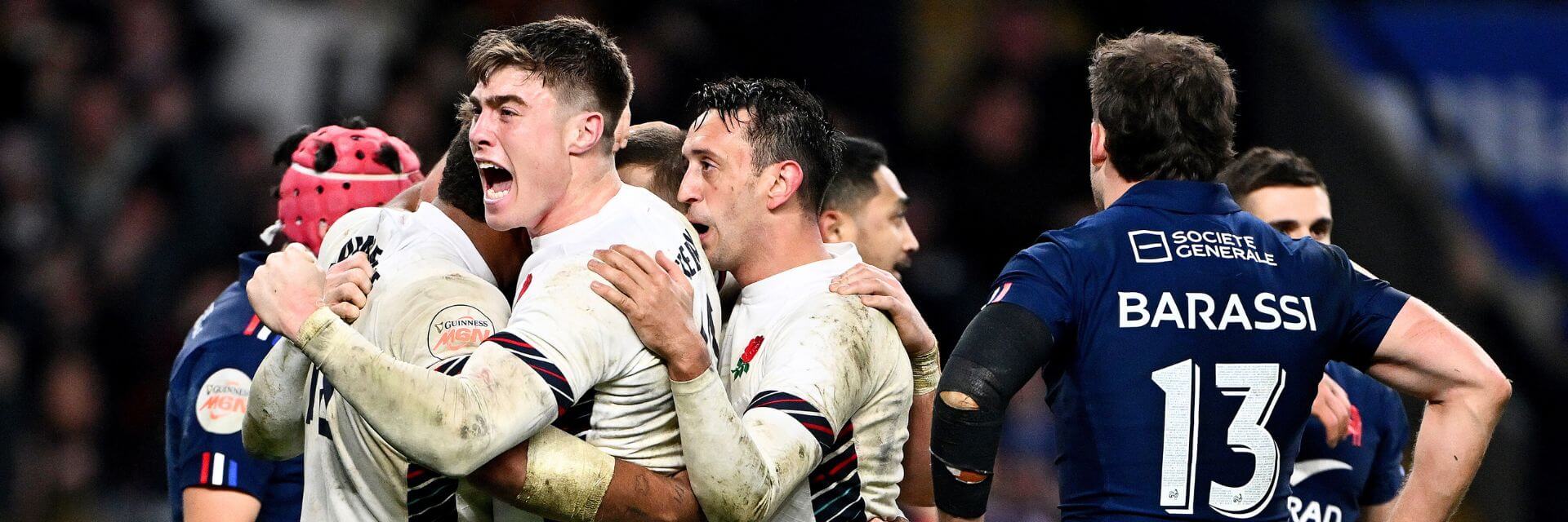 England celebrate a try against France