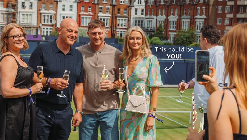 Guests enjoying their VIP experience on the Club Lounge roof terrace, at the Queen's club.