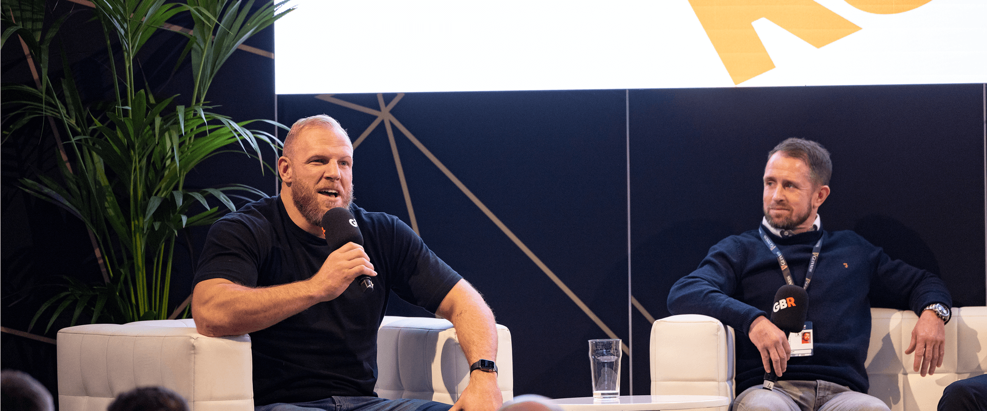 close up of James Haskell and Shane Williams on stage in the Players Lounge