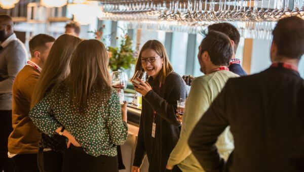 Guests enjoying themselves at The East Wing bar