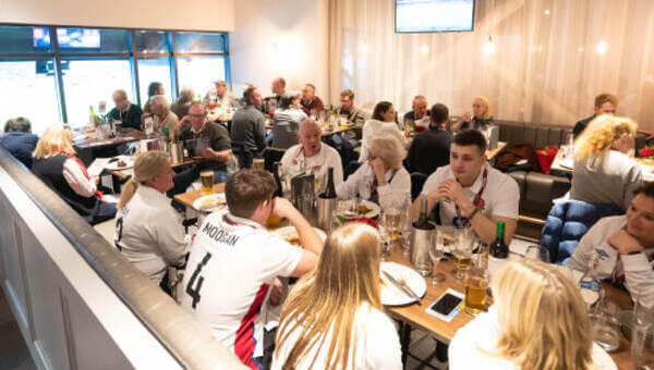 Guests enjoying hospitality in The Lock's pitch view booths