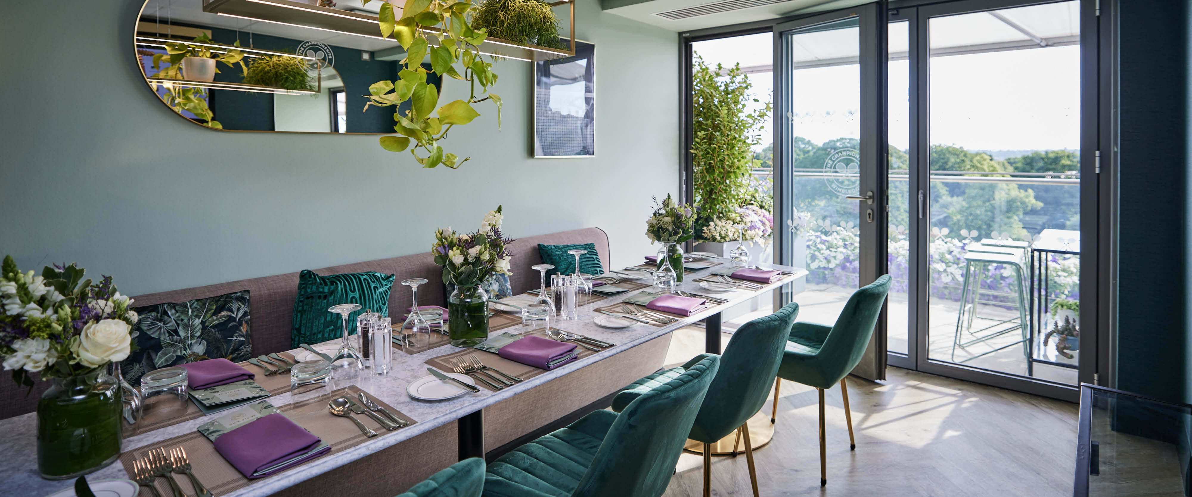Skyview Suite set up for guests overlooking the courts and grounds from private terrace at The Championships Wimbledon