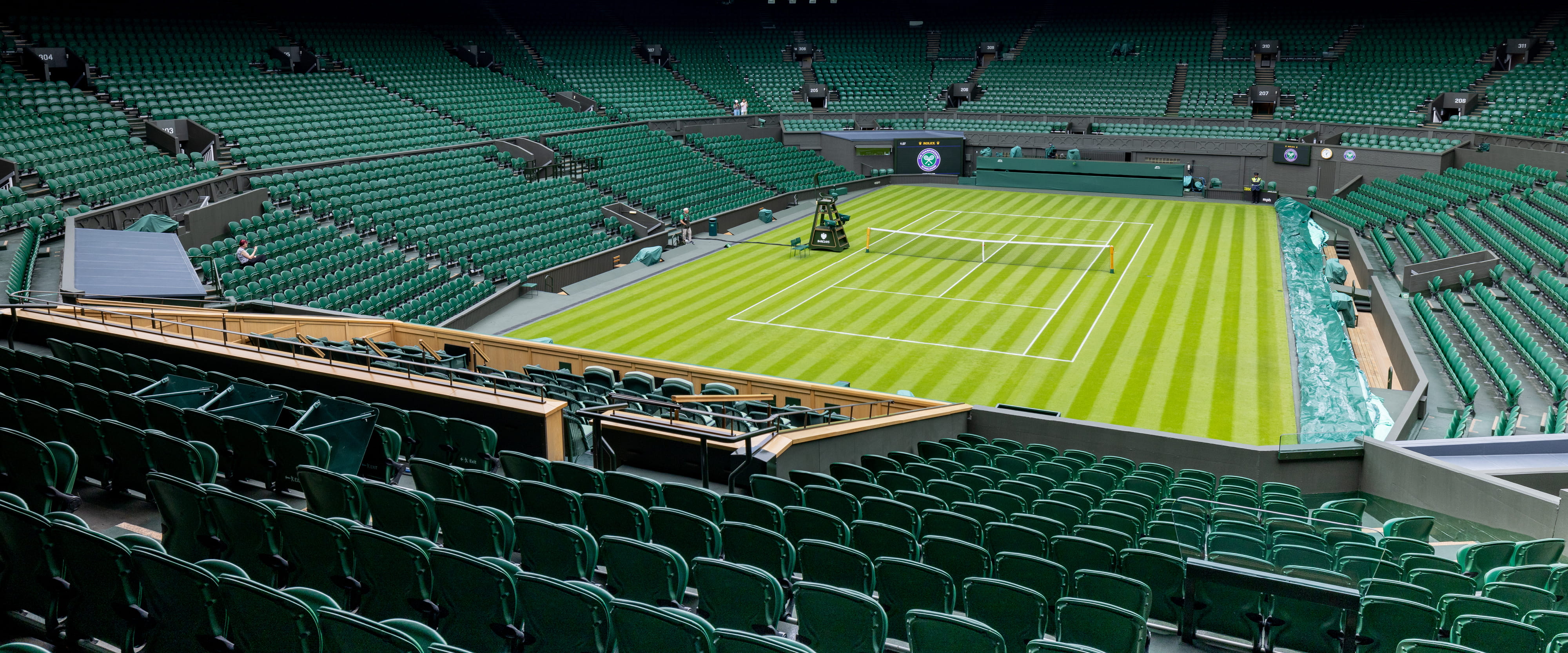 Empty view of Wimbledon Centre Court for Treehouse and Rosewater Pavilion hospitality facility court seat allocation