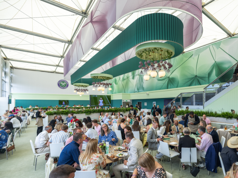 large hospitality suite at wimbledon filled with guests